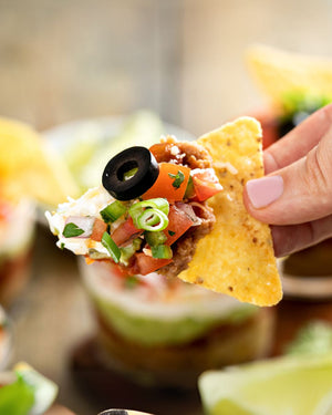 Taschen’s Tailgate 6-Layer Non-Dairy Dip: A Dairy-Free Take on the Classic Seven Layer Dip