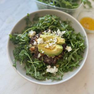 Venison Burger over Arugula Salad with Goat Cheese, Avocado, and Mustard Vinaigrette